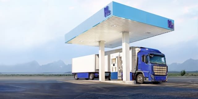 Hydrogen vehicle at a refueling station