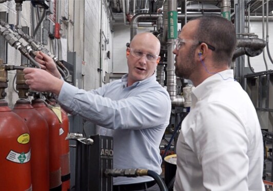 Engineers inspecting a gas distribution system