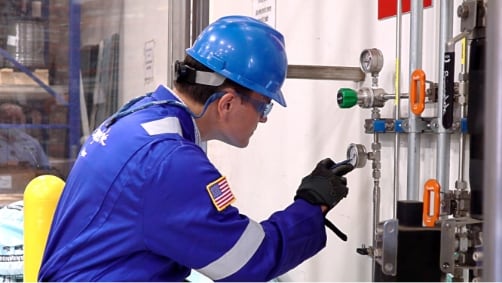 Field engineer inspecting a gas distribution system