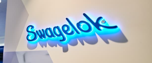 Illuminated Swagelok Company sign