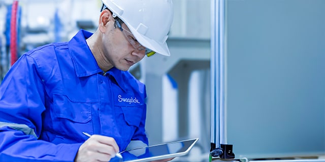 Engineer working in a semiconductor fabrication plant