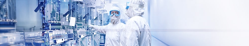 Semiconductor equipment technicians in a laboratory