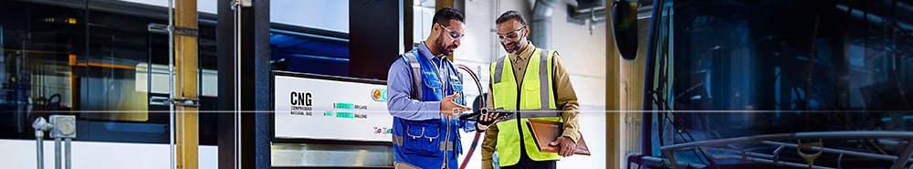Clean energy engineers at a CNG facility