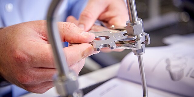 Swagelok installation training attendee checks their work with a gap inspection gauge.