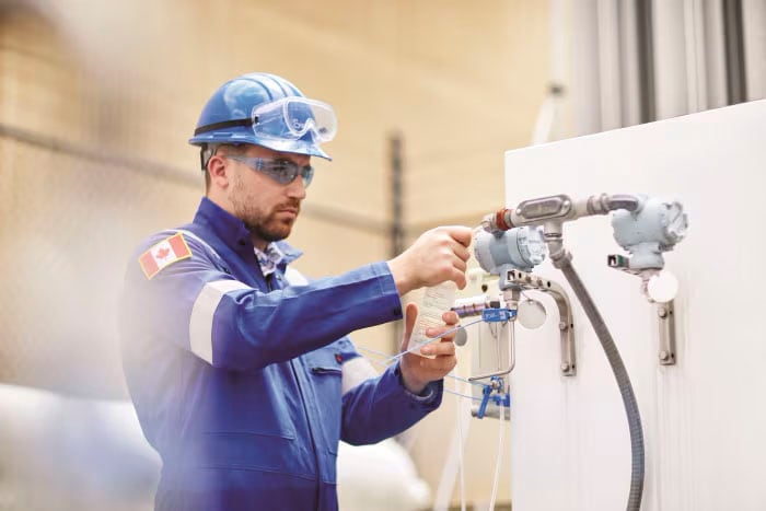 Swagelok Field Engineer performs compressed gas leak detection
