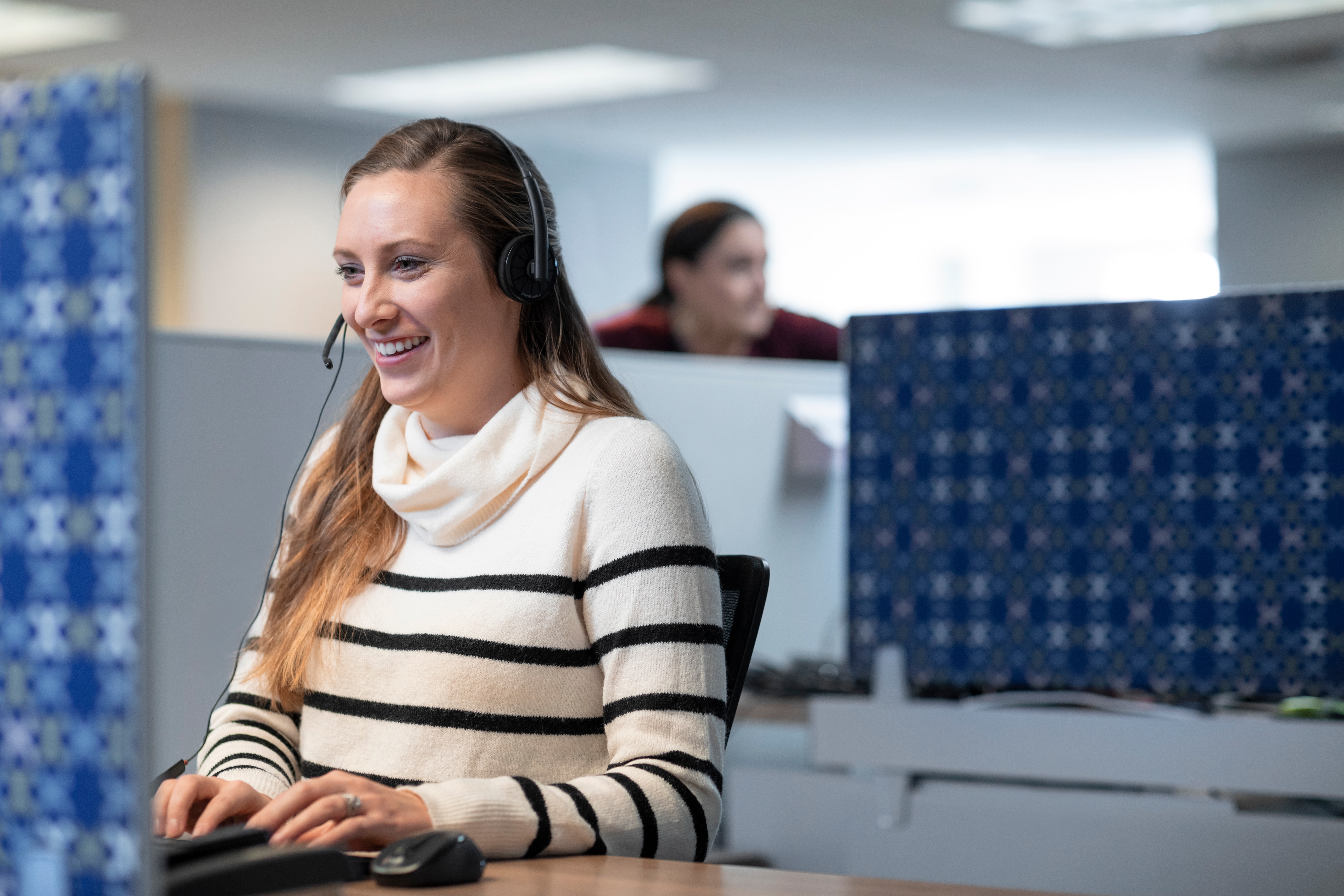 Swagelok Photo Woman at Desk
