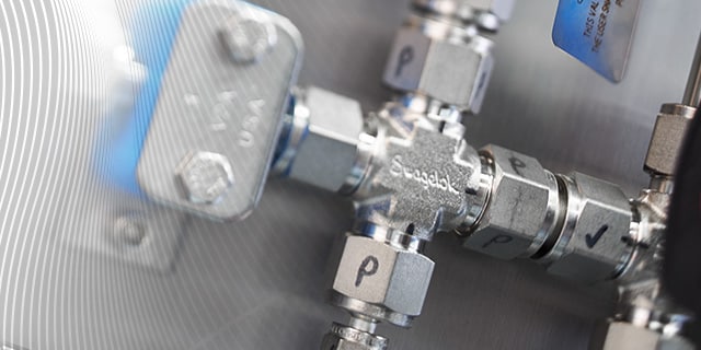 Close up on an installed tube fitting in a process system