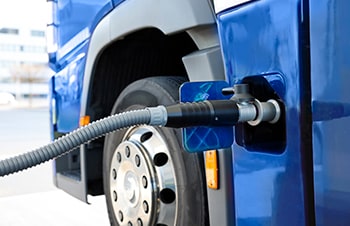 Hydrogen vehicle at a refueling station