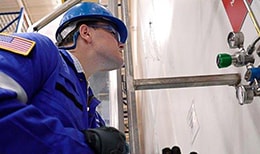 Swagelok engineer inspects a gas distribution panel