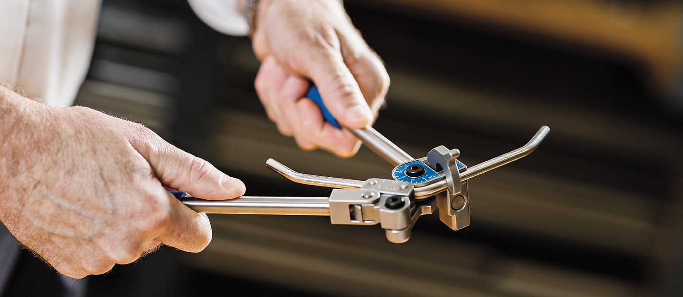 A Swagelok hand tube bender in use